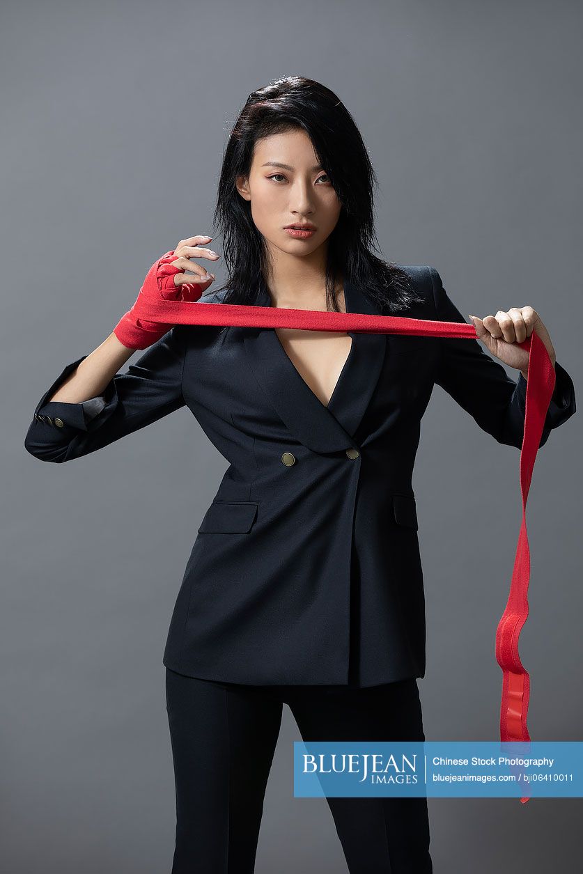 Cool young Chinese woman in suit