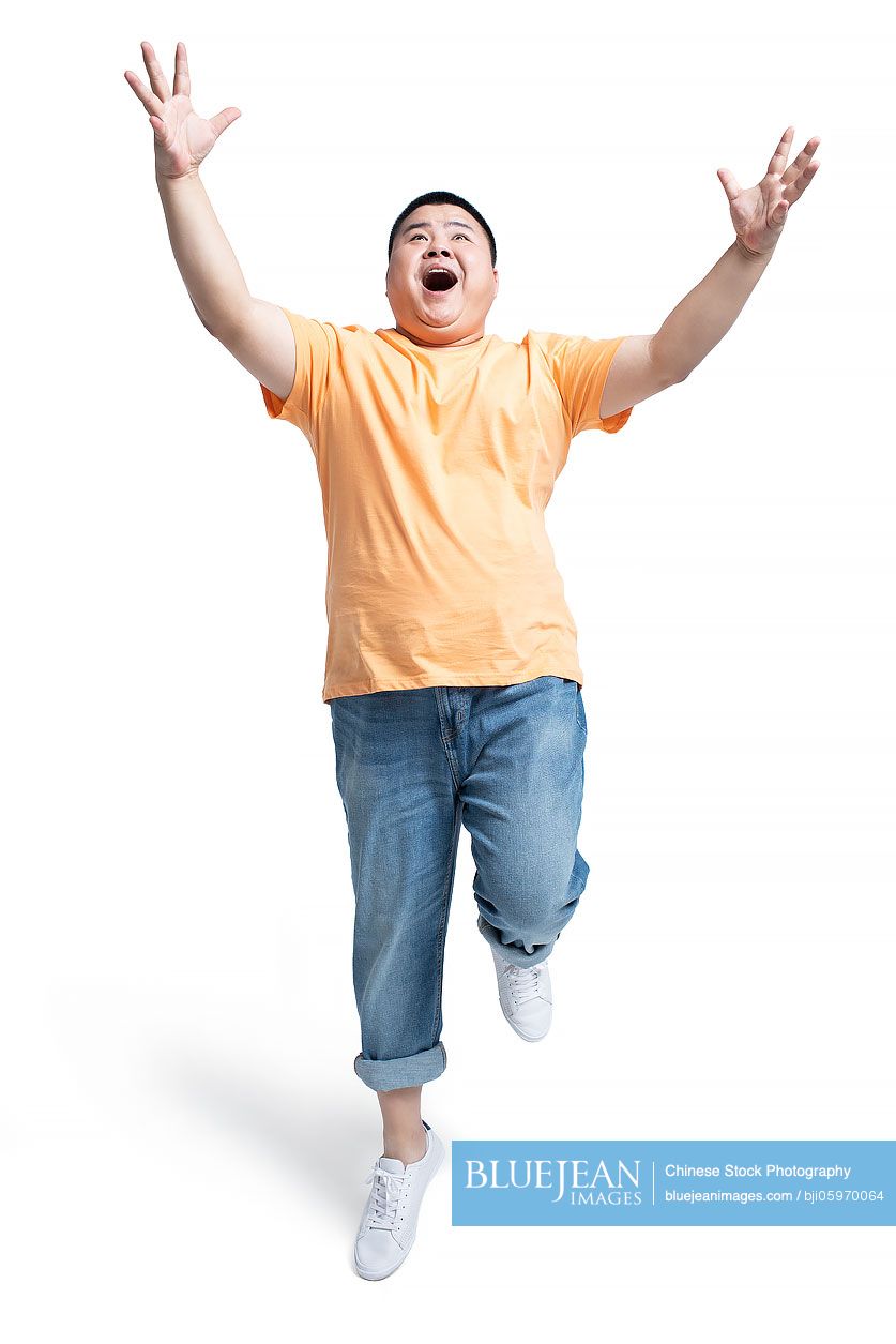 Young Chinese man being surprised
