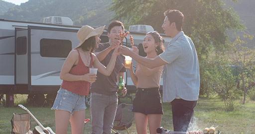 Happy young Chinese friends having fun outdoors,4K