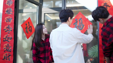 Young friends celebrating Chinese New Year together