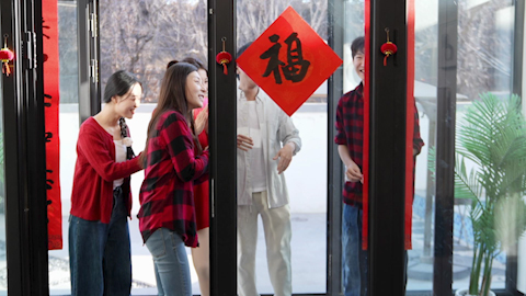 Young friends celebrating Chinese New Year together