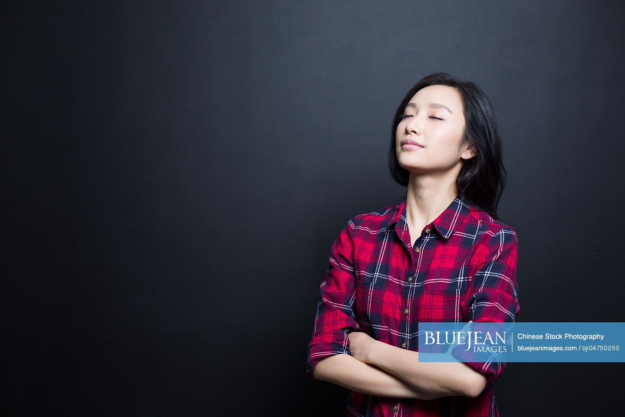Happy young Chinese woman