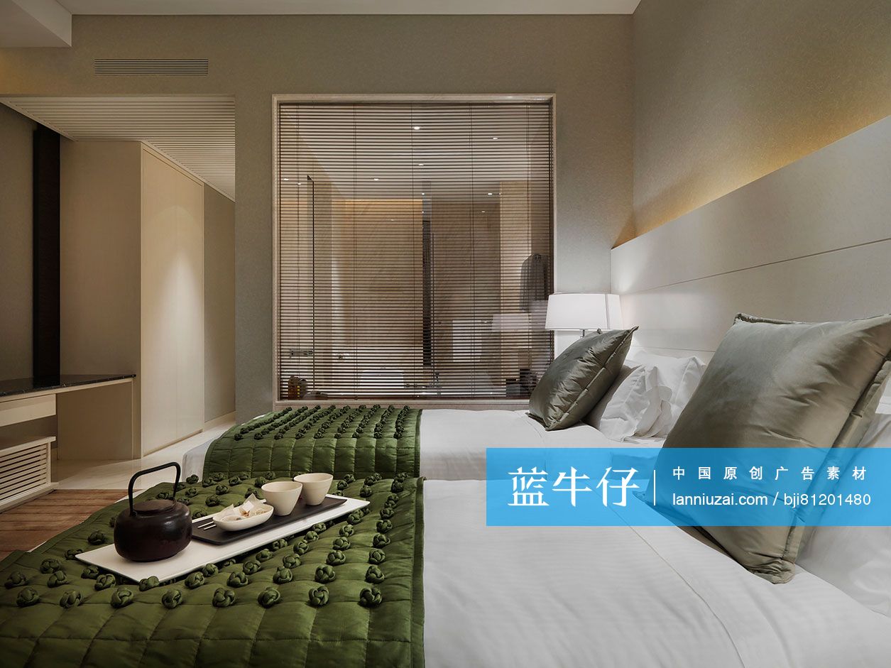 Twin beds in modern hotel room