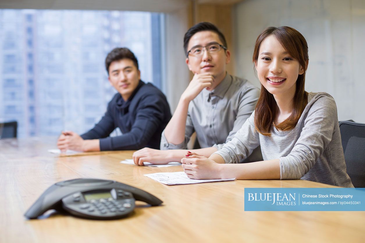 Chinese business people having a meeting in board room