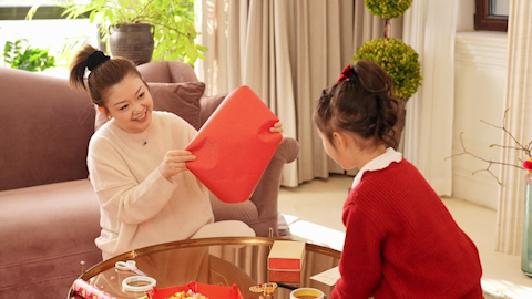 Family joyfully celebrating Chinese New Year together