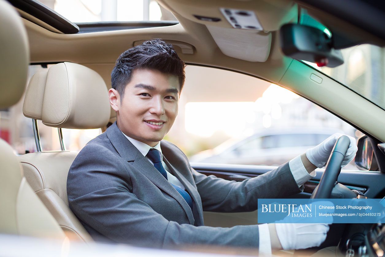 Chinese chauffeur driving car
