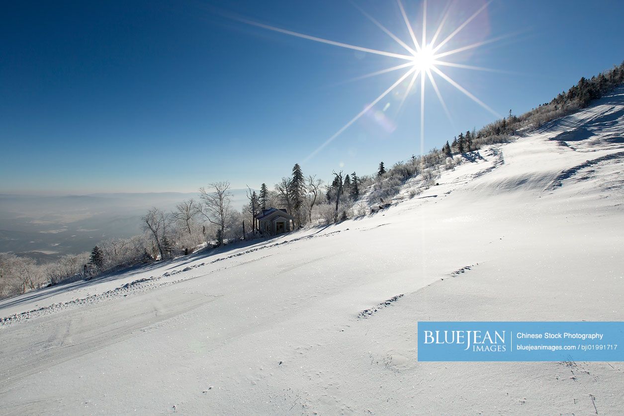 Sun shining on snow, China