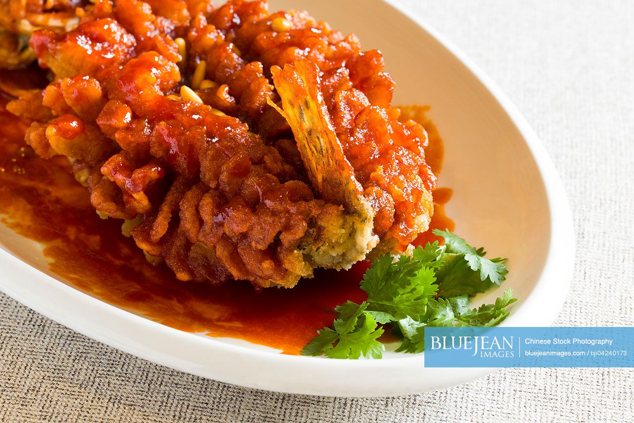 Chinese cuisine fish with pine nuts
