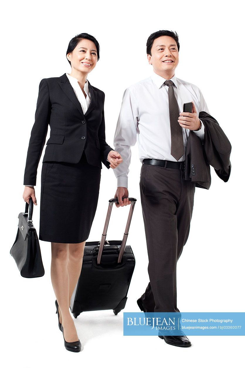 Chinese business partner walking side by side