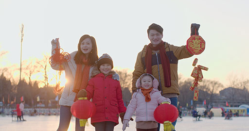Happy young Chinese family celebrating Chinese New Year,4K