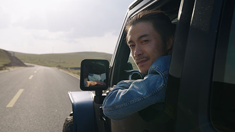 Happy Chinese mid adult man enjoying road trip,4K
