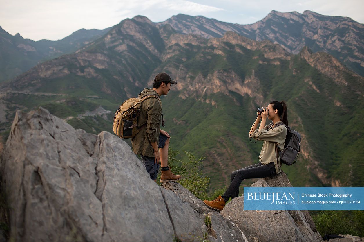Young couple hiking outdoors