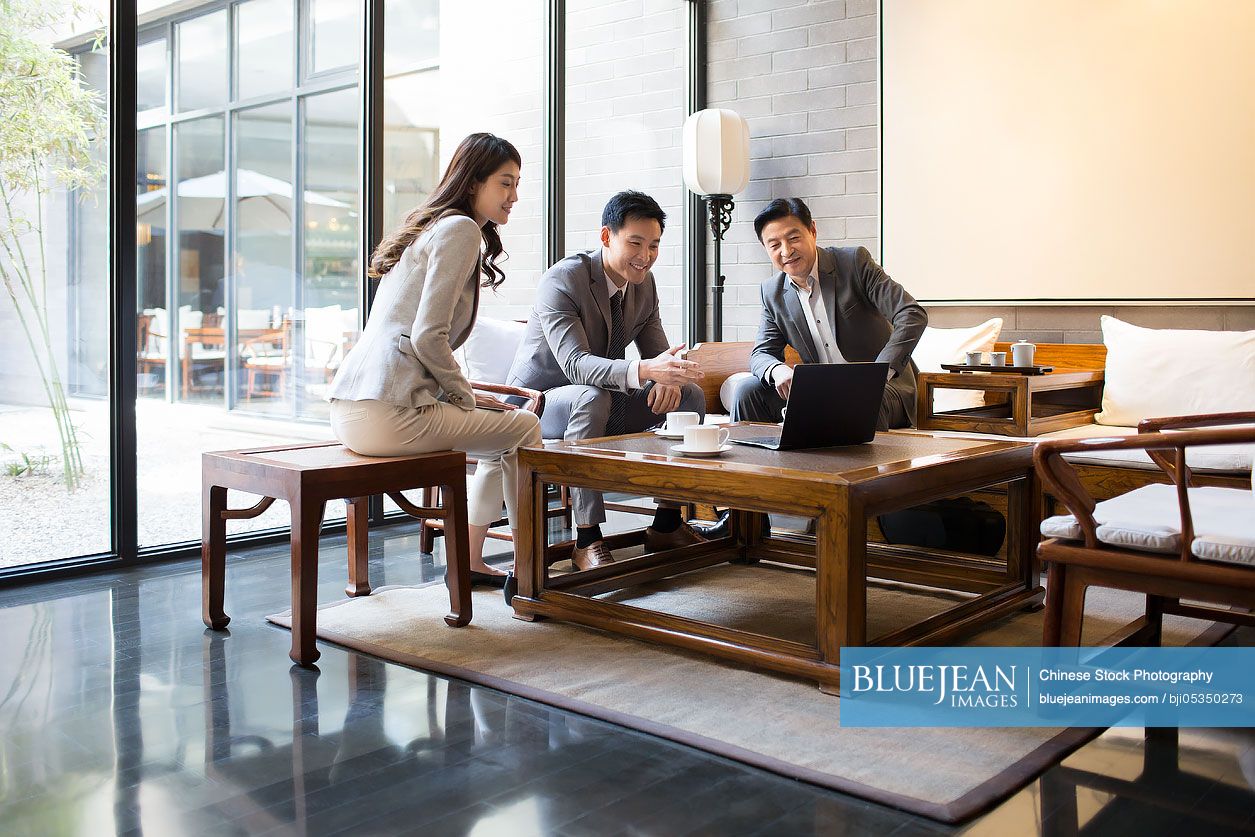 Chinese business people having a meeting