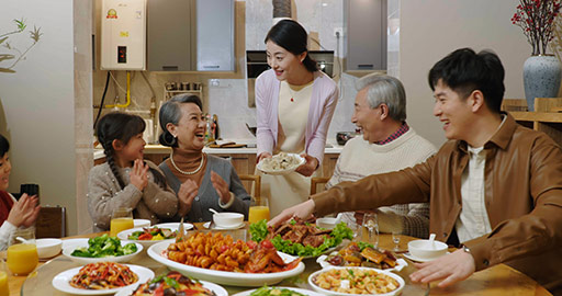 Happy family having Chinese New Year dinner,4K