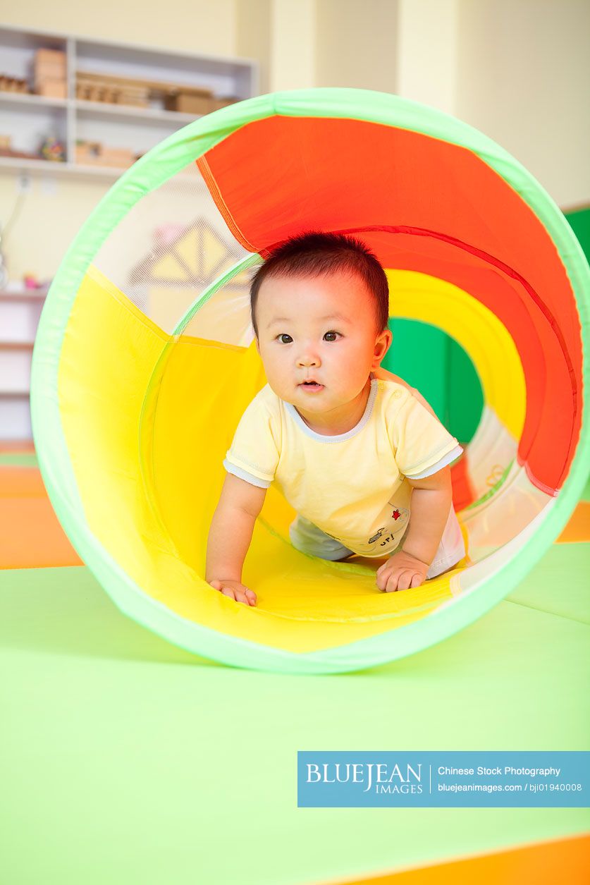 Chinese baby boy crawling