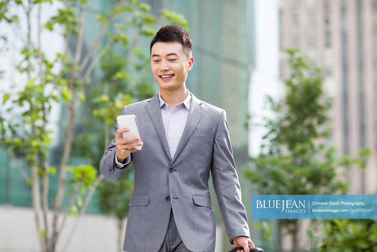 Chinese businessman with mobile phone