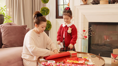 Family joyfully celebrating Chinese New Year together
