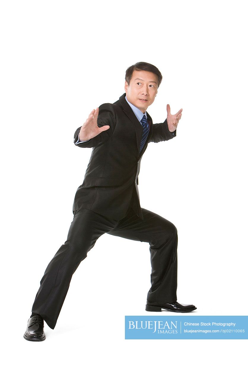 full body of a chinese man on a white background Stock Photo