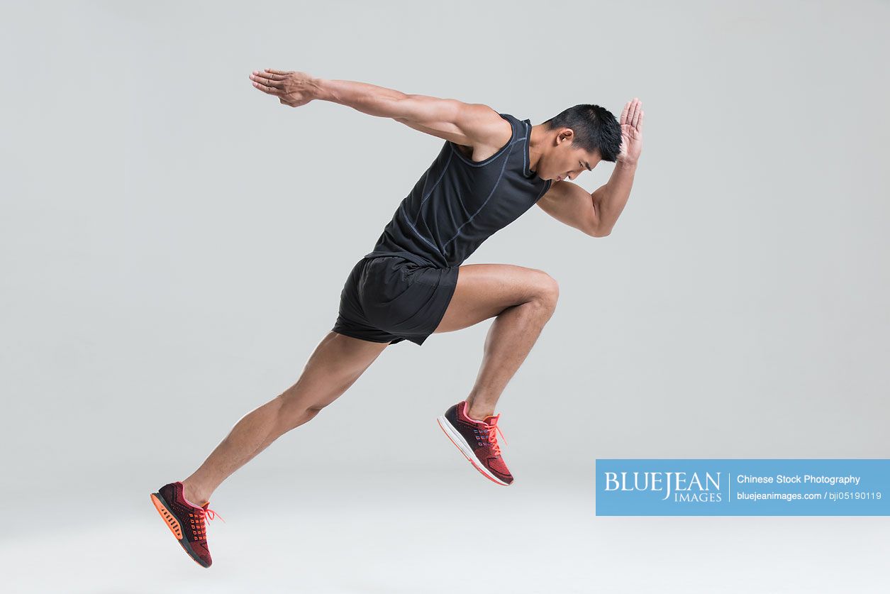 Male Chinese athlete running