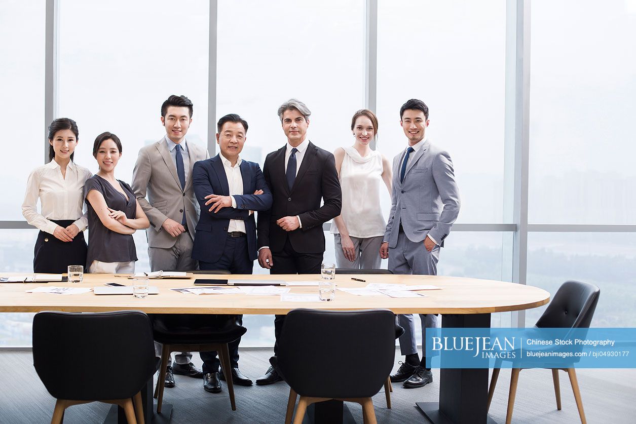 Portrait of business people in meeting room