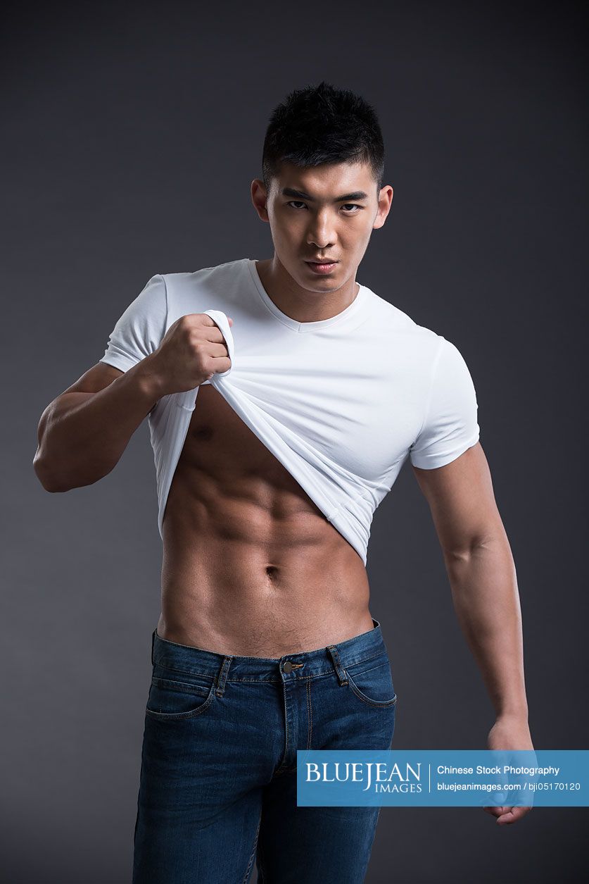 Portrait of young Chinese muscular man