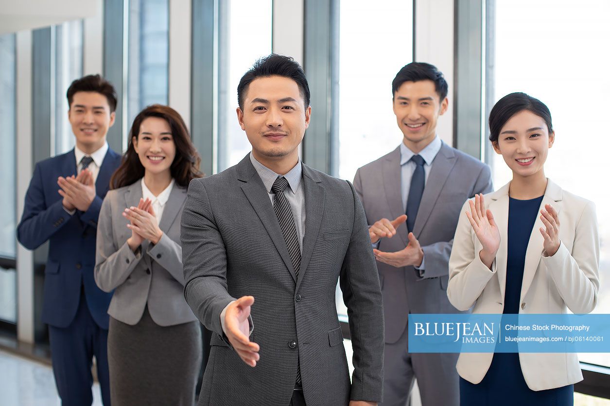 Successful Chinese business people in office