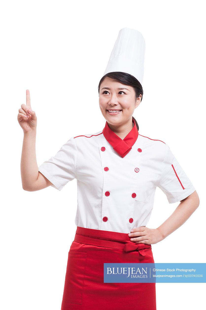 Female Chinese cook pointing up