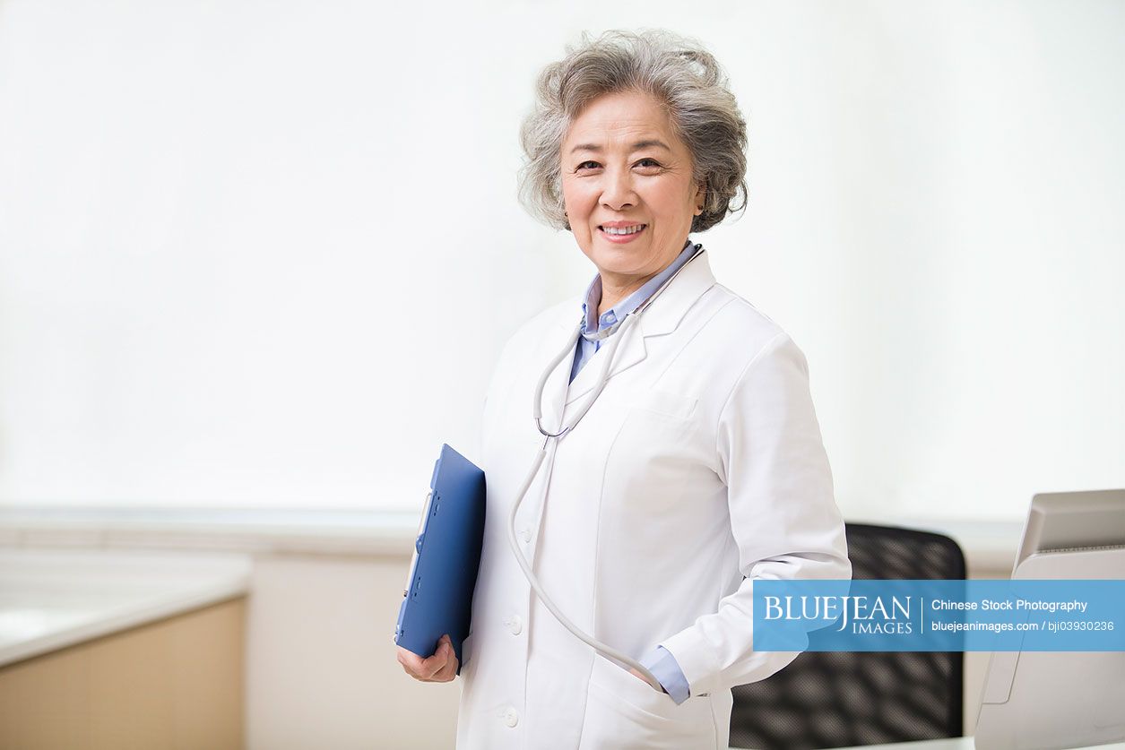 Portrait of senior female Chinese doctor