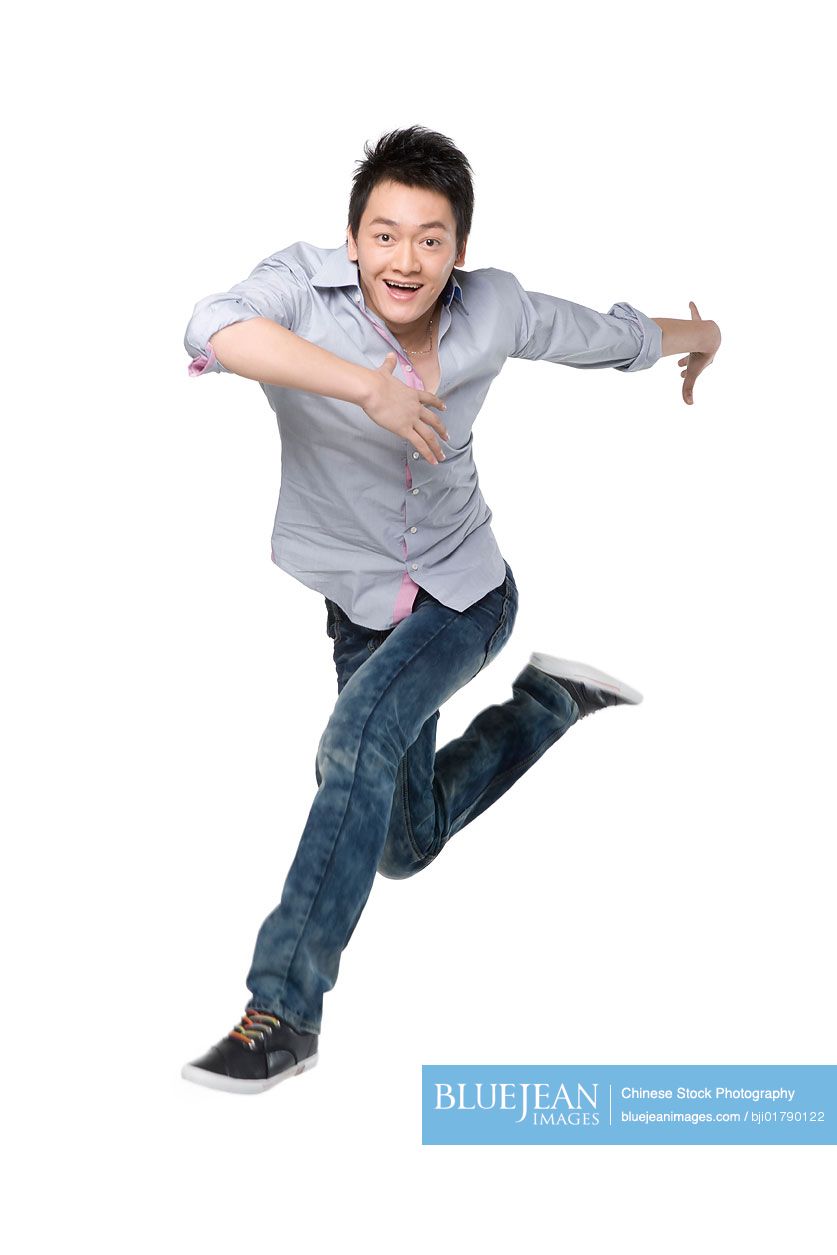 Young Chinese man in motion