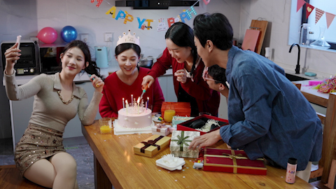 Young friends celebrating a birthday together