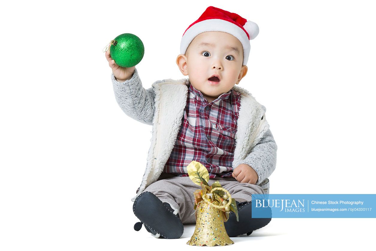 Cute Chinese baby with Christmas decoration