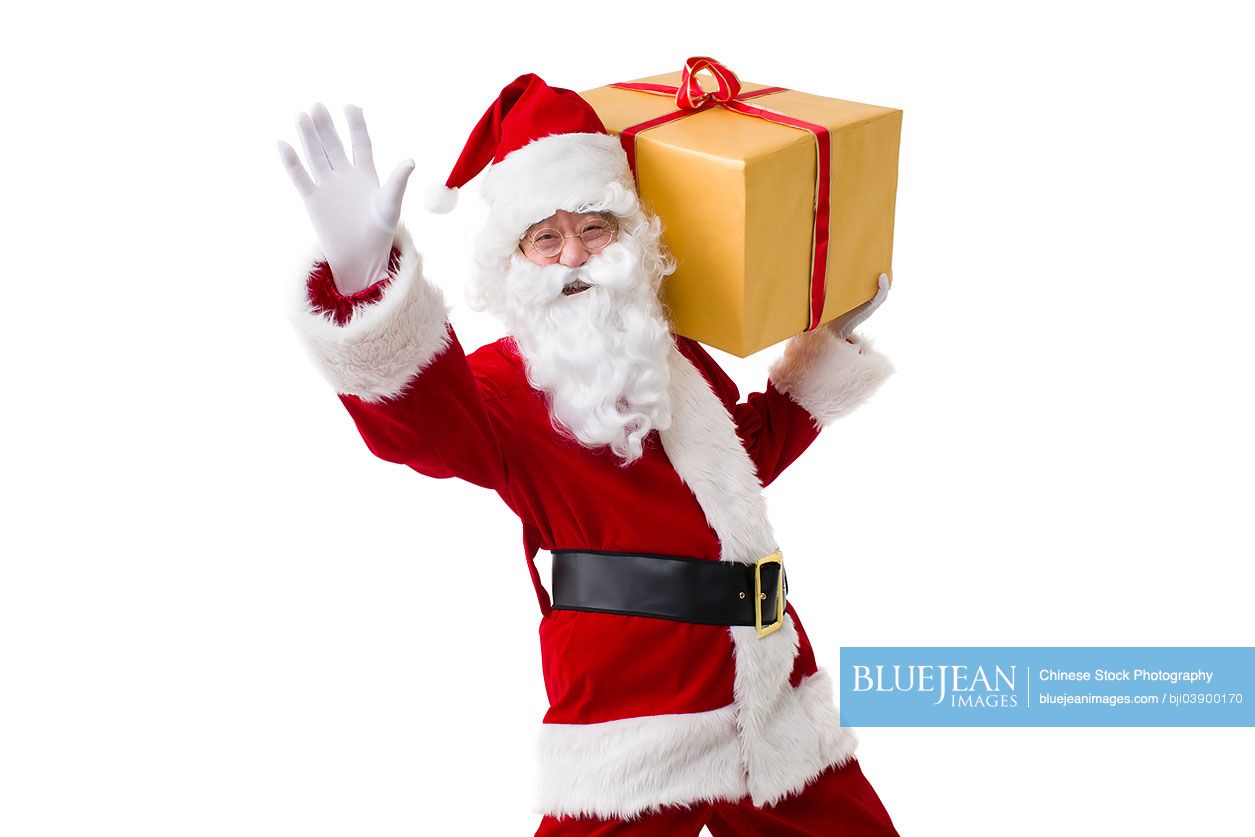 Santa Claus with heavy Christmas gift