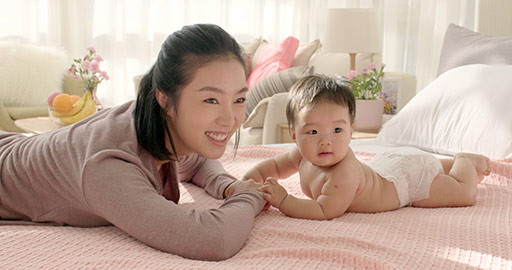 Young Chinese mom taking care of baby girl,4K