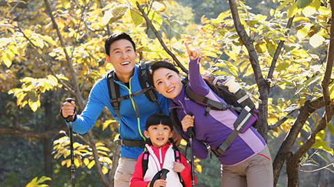 Happy young Chinese family on a hike,HD