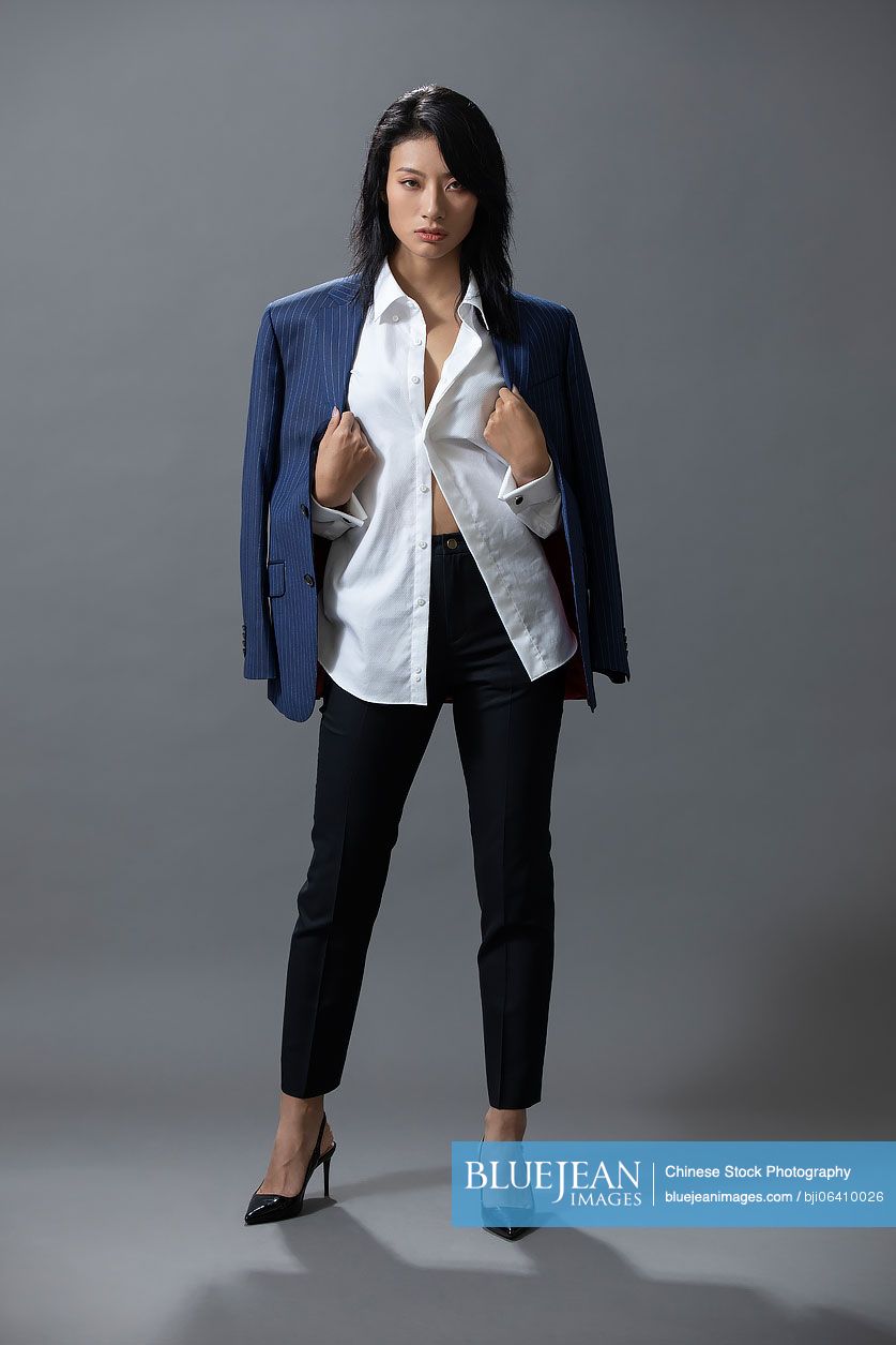 Cool young Chinese woman in suit