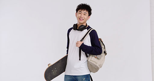 Male Chinese college student with skateboard,4K