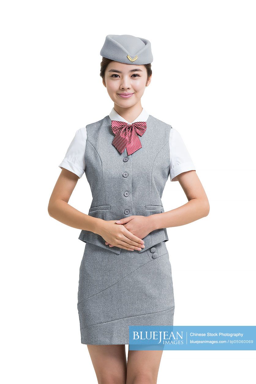Portrait of smiling Chinese airline stewardess