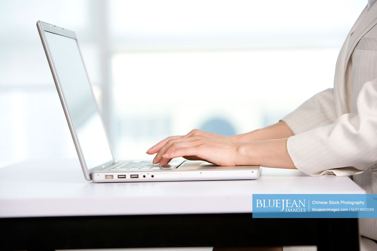 Office worker using her computer