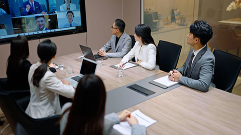 Confident Chinese business people having a meeting