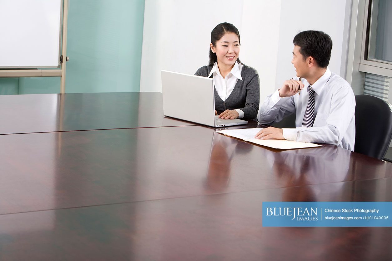 Chinese office workers in the conference room