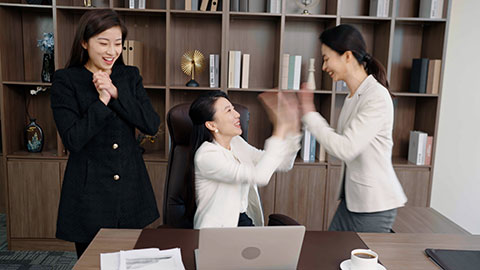 Confident Chinese business people having a meeting