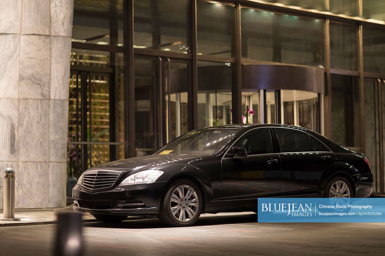 A car in front of the luxury hotel-High-res stock photo for download image