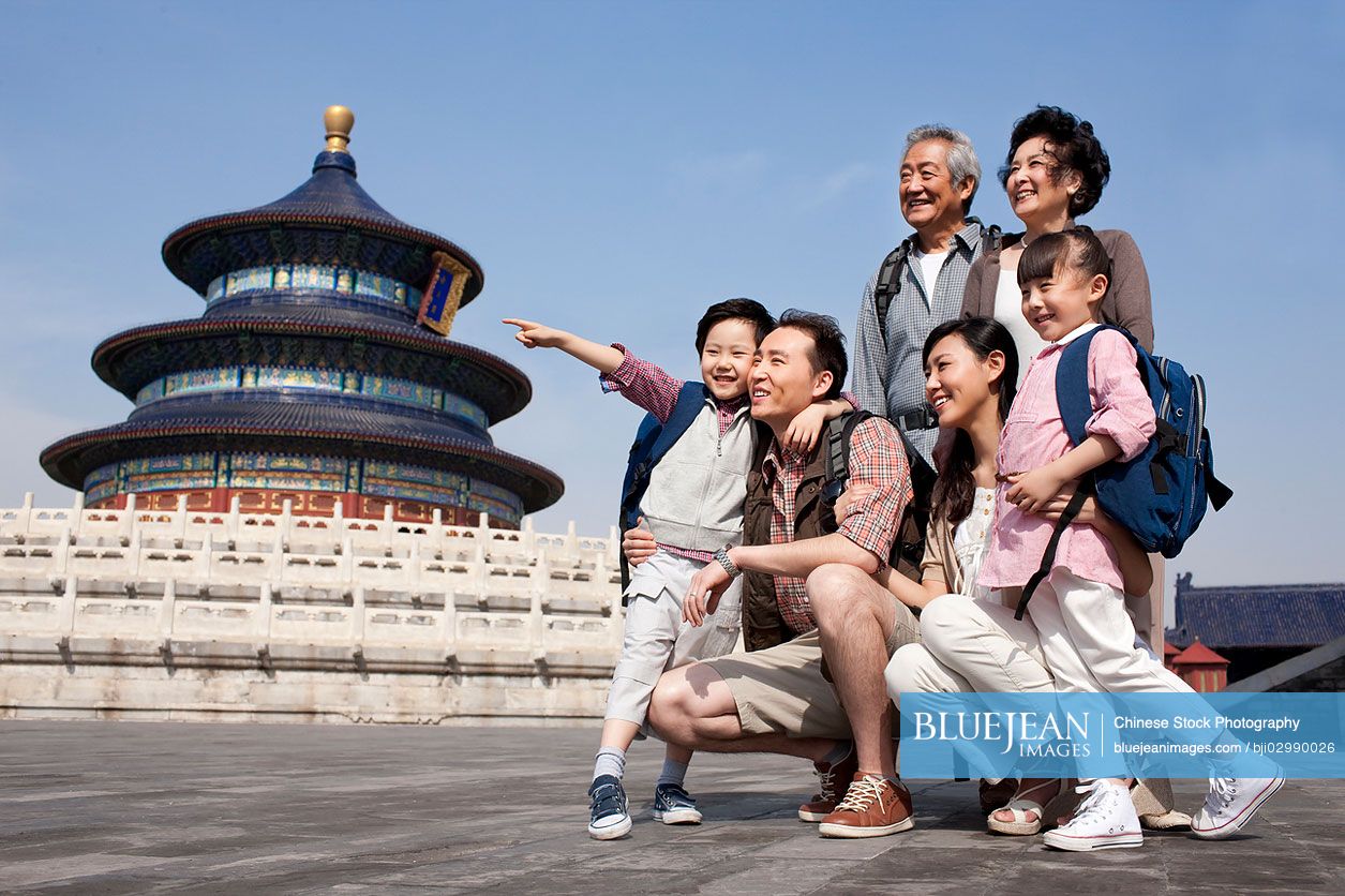 Happy Chinese family travelling at Temple of Heaven in Beijing, China