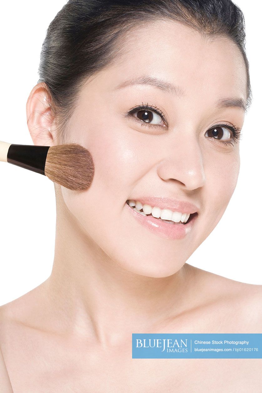 young-chinese-woman-with-a-blusher-high-res-stock-photo-for-download