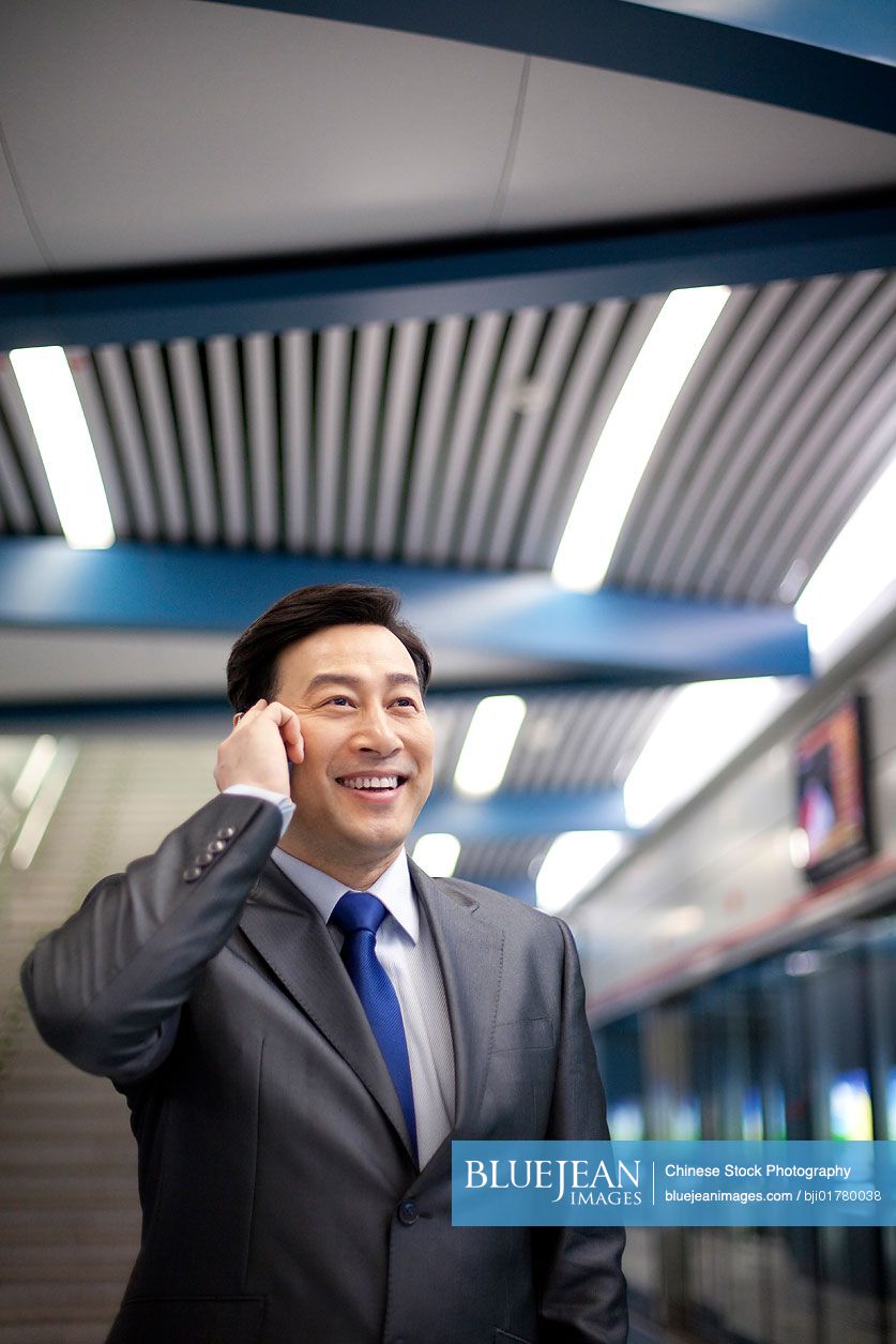 Chinese commuter on the phone