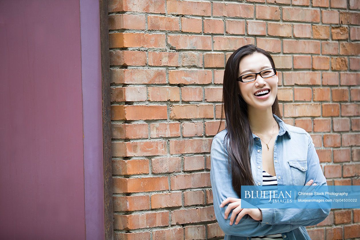Happy young Chinese woman