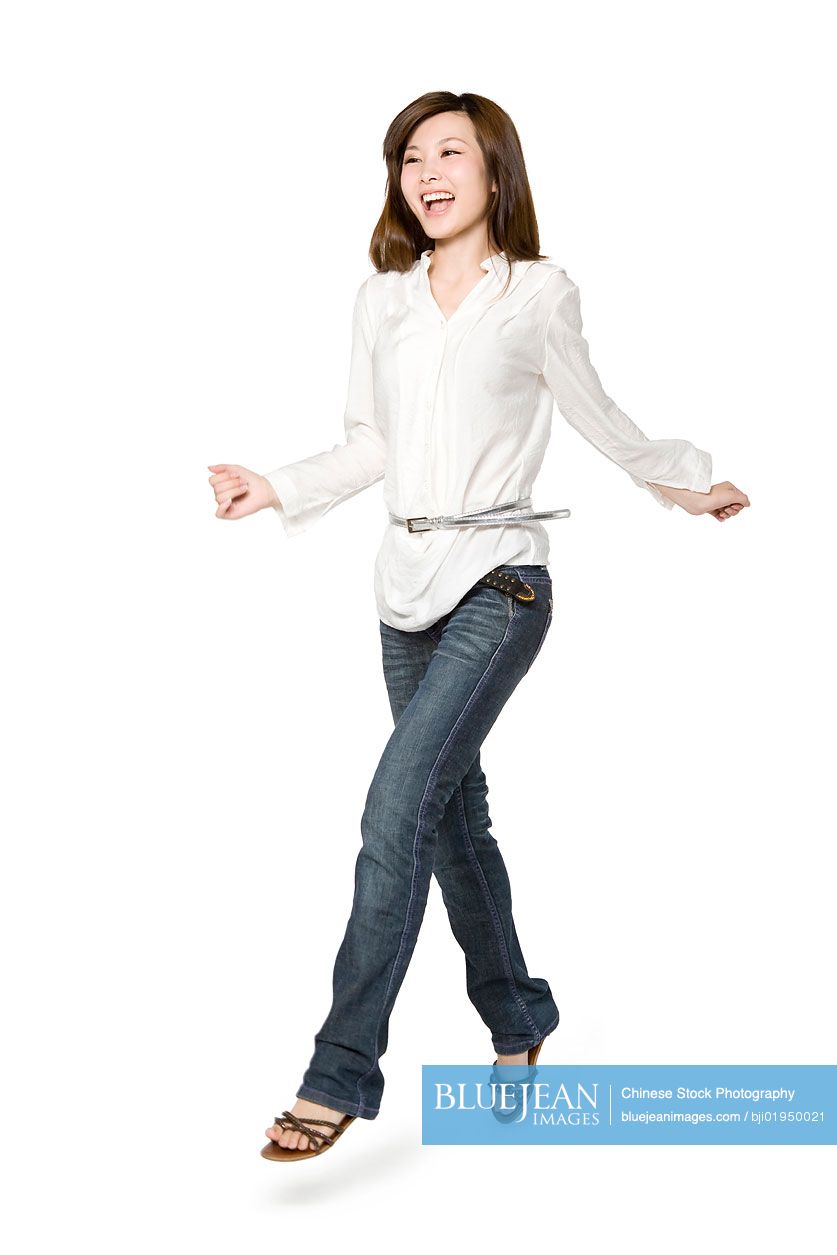 Portrait of young Chinese woman dancing