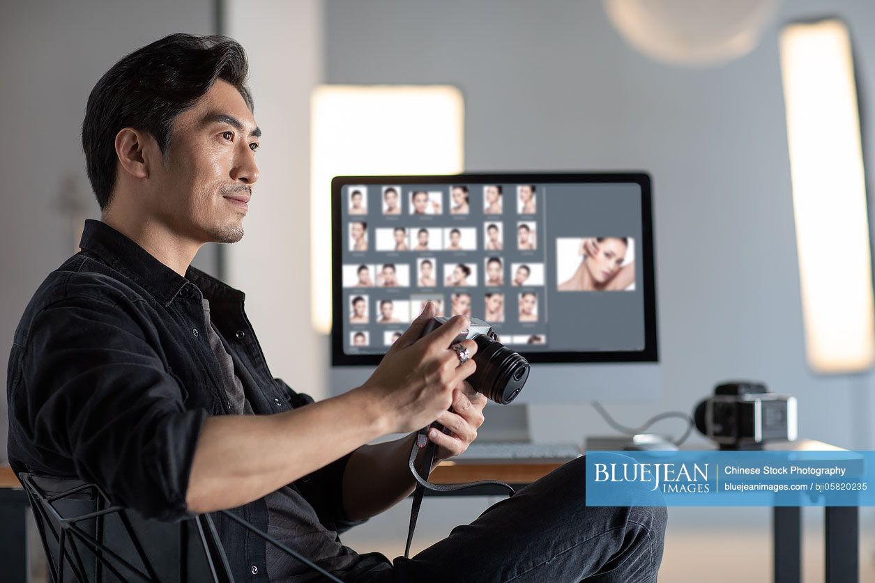 Chinese photographer in studio