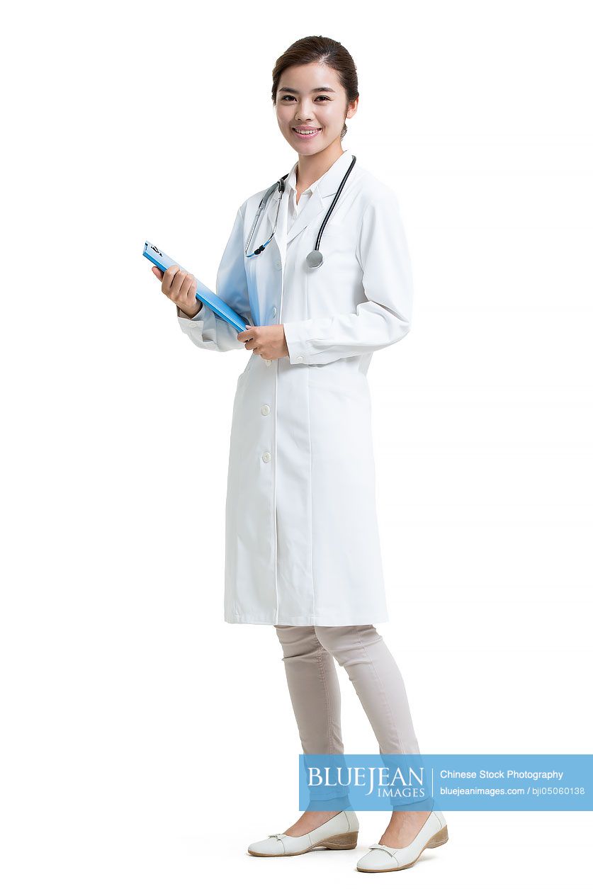 Portrait of smiling young female Chinese doctor