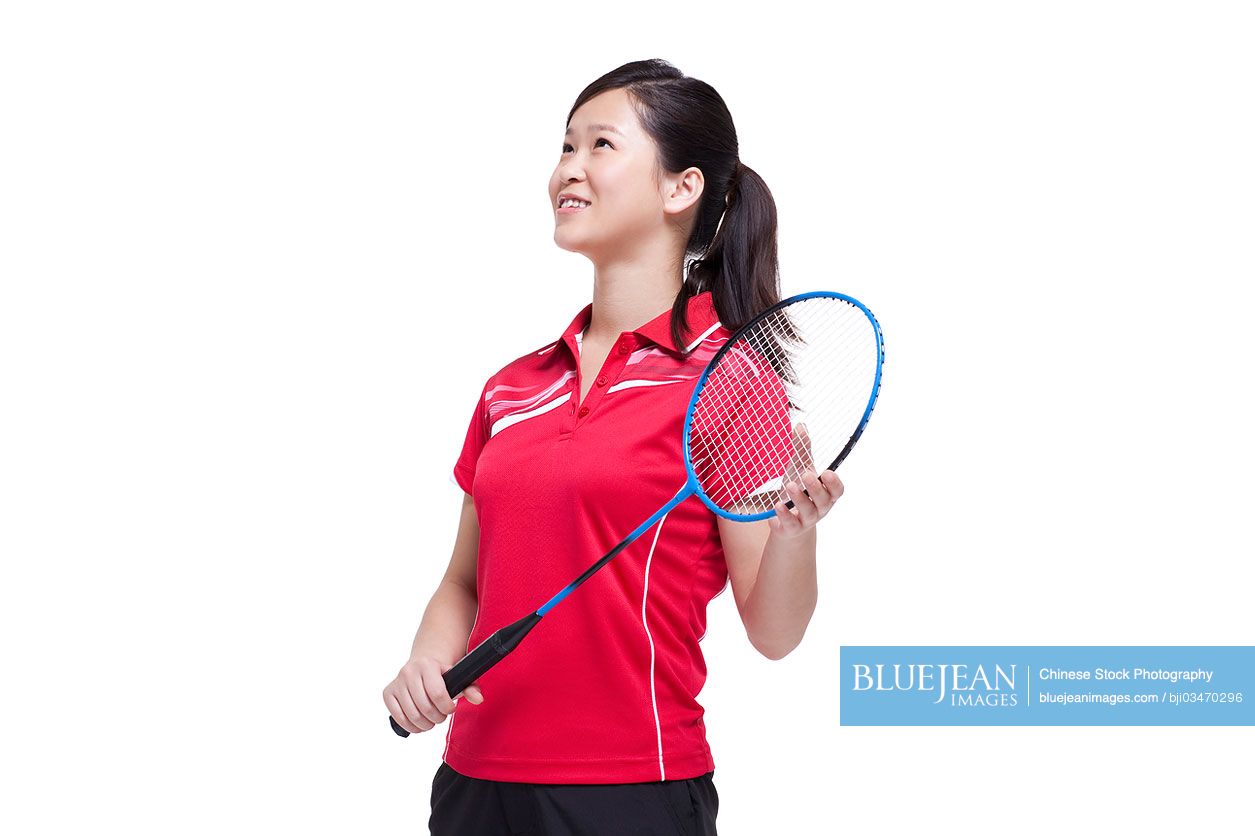 Female Chinese athlete playing badminton